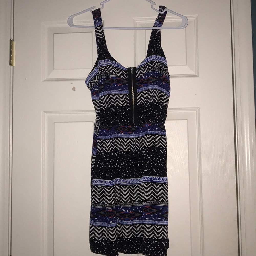 Summer slip on dress with a fake zipper on front.